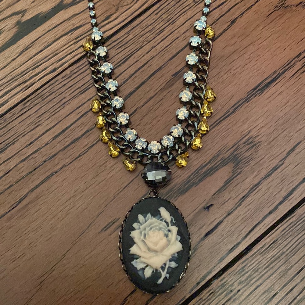 Necklace with camellia pendant